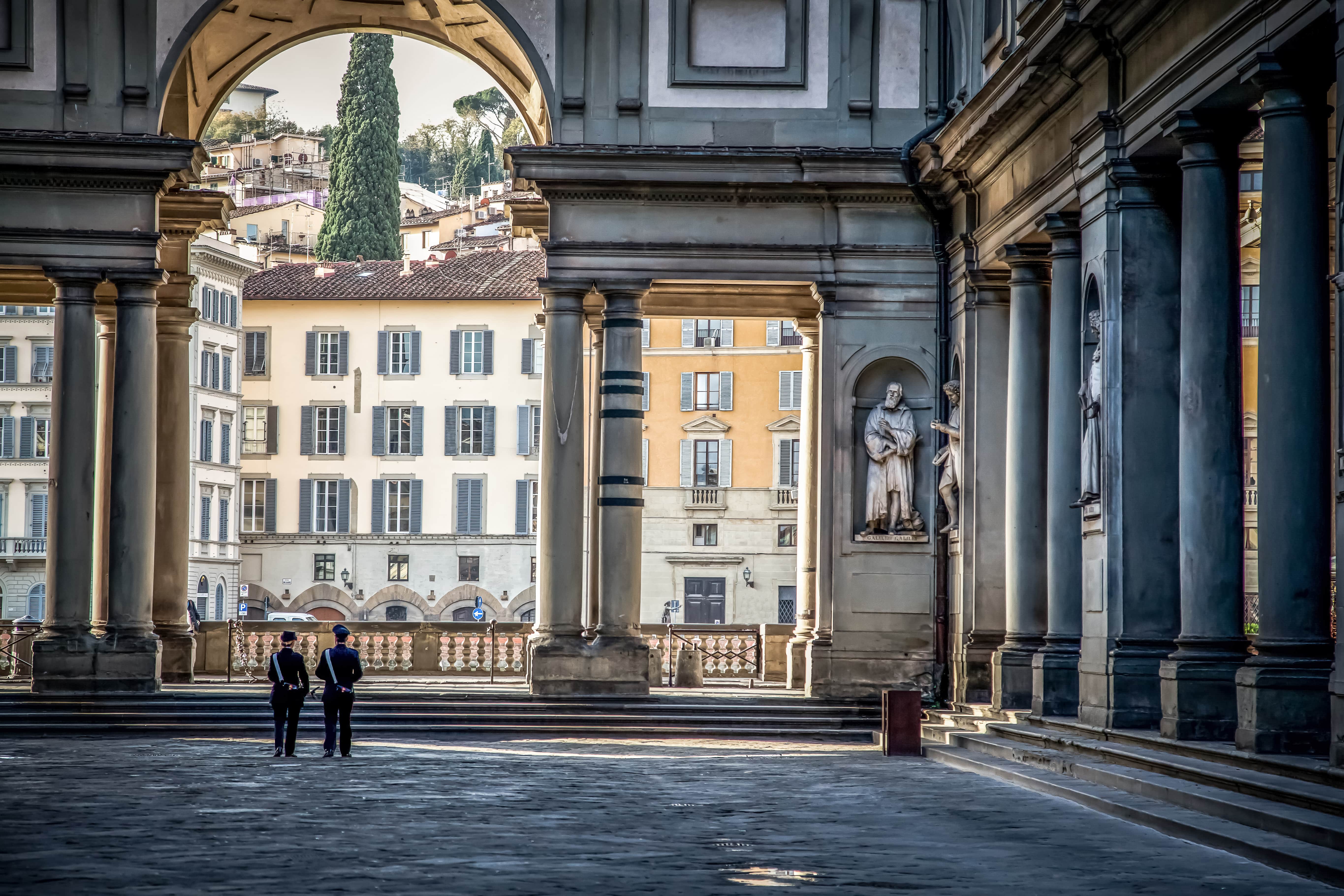 Piazza degli Uffizi square in the early Sunny autumn morning. Florence, Tuscany, Italy